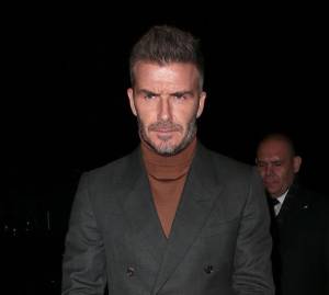 david beckham wearing a turtleneck with a suit