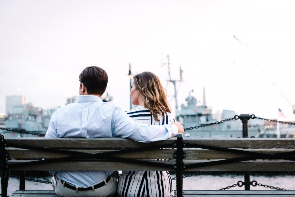 couple, stylish couple, man and woman sitting on a bench, 