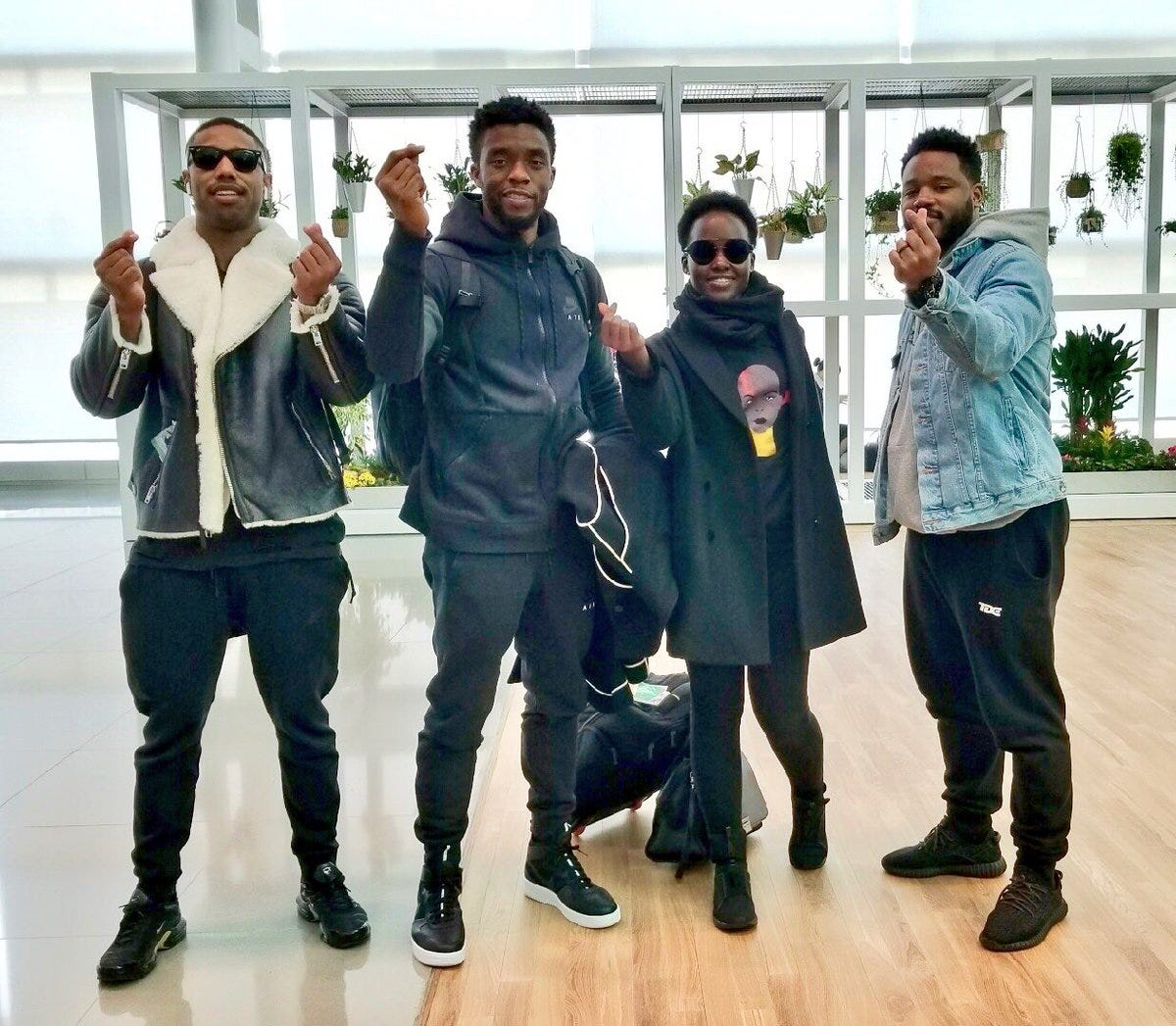 Black Panther cast airport travel style