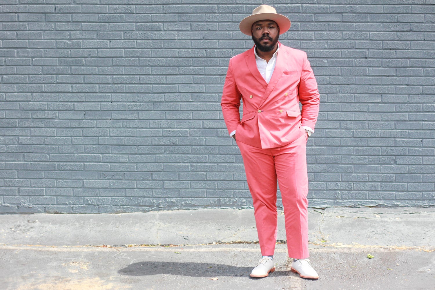 notoriously dapper bright suit