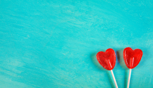 two heart sucker candies