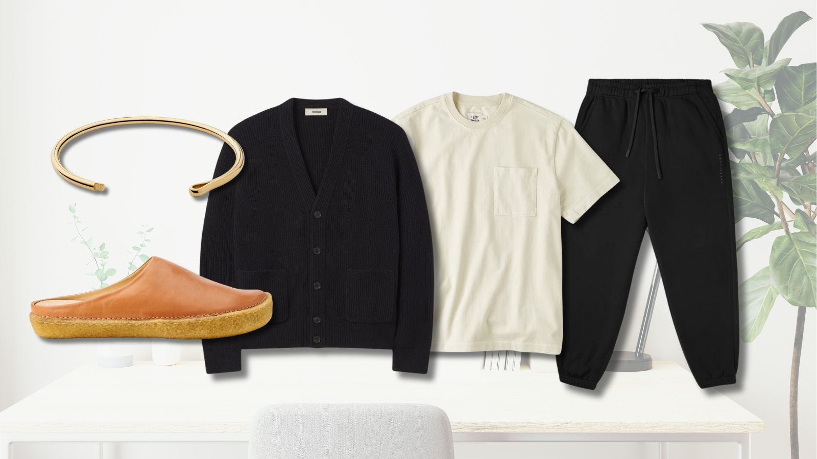 casual yet stylish men's outfit for working from home, featuring a black cardigan, black sweatpants, and brown leather slip-on shoes