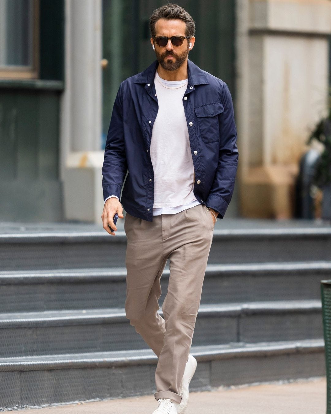 Ryan Reynolds in white t-shirt and chinos