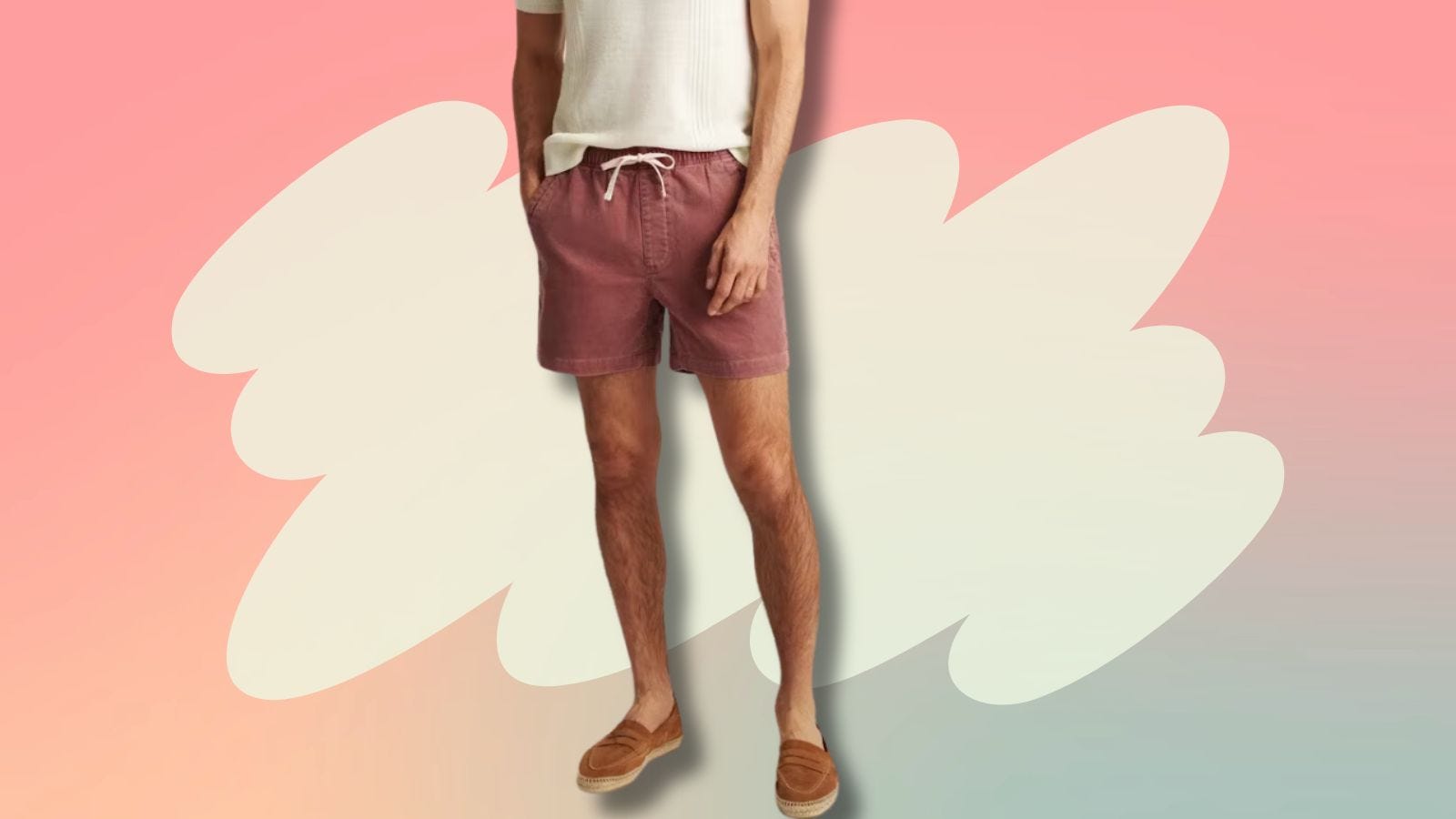 image of lower torso and legs of a man wearing a cream-colored short sleeve shirt with red corduroy drawstring shorts and brown suede espadrilles
