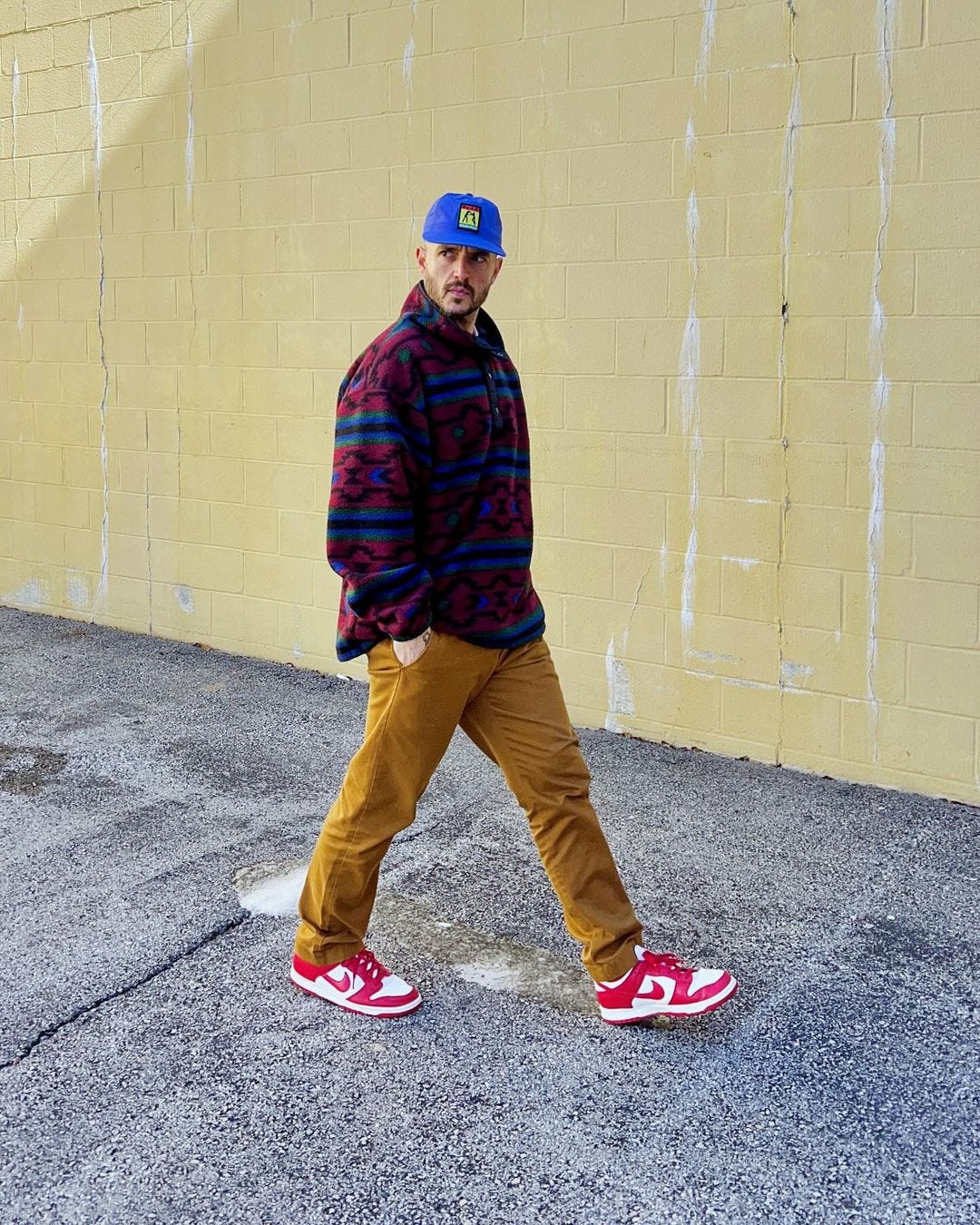 men's style instagram influencer @jesse_wines wearing red Nike sneakers