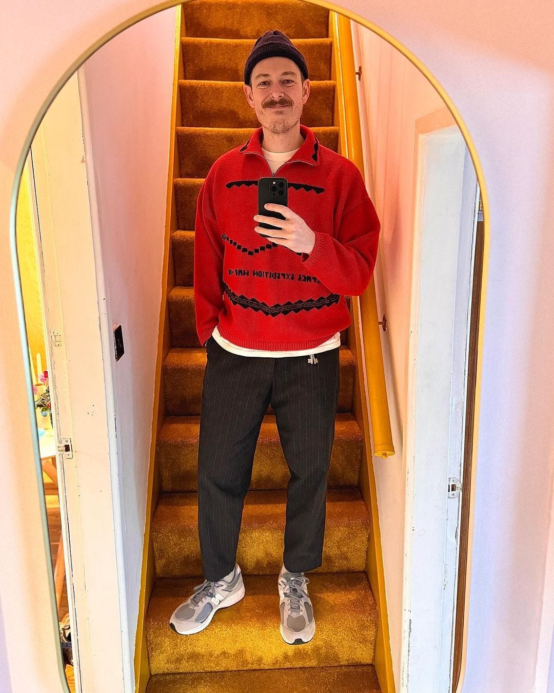instagram men's style influencer wears_oli wearing a red sweater