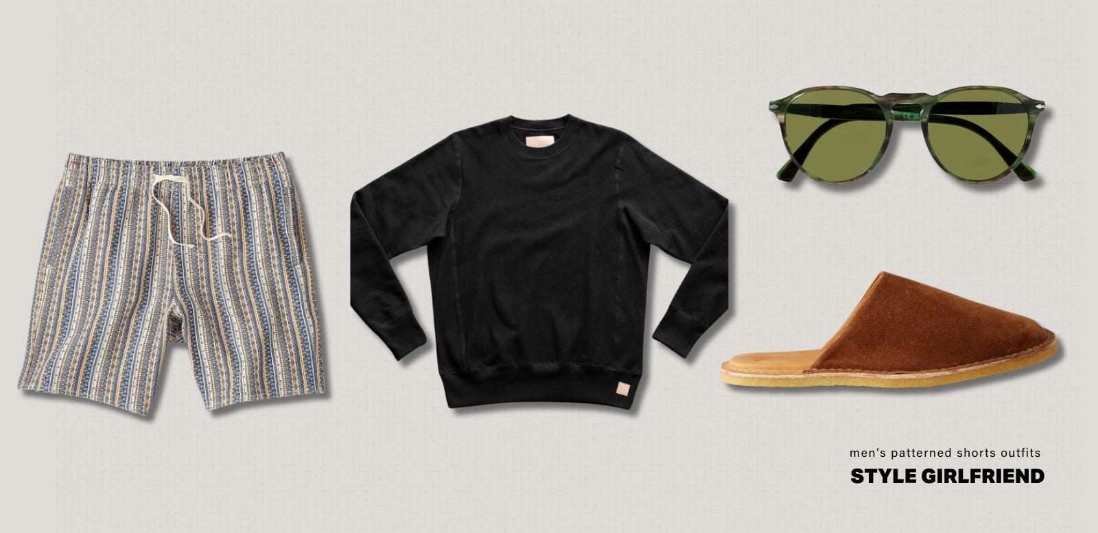 flat lay of men's casual shorts outfit, featuring patterned shorts, a black crewneck sweatshirt, slip-on shoes, and green-rimmed sunglasses