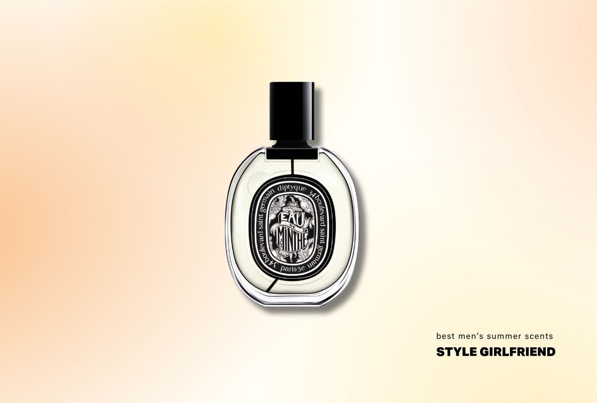 oval bottle of fragrance with black label and black cap