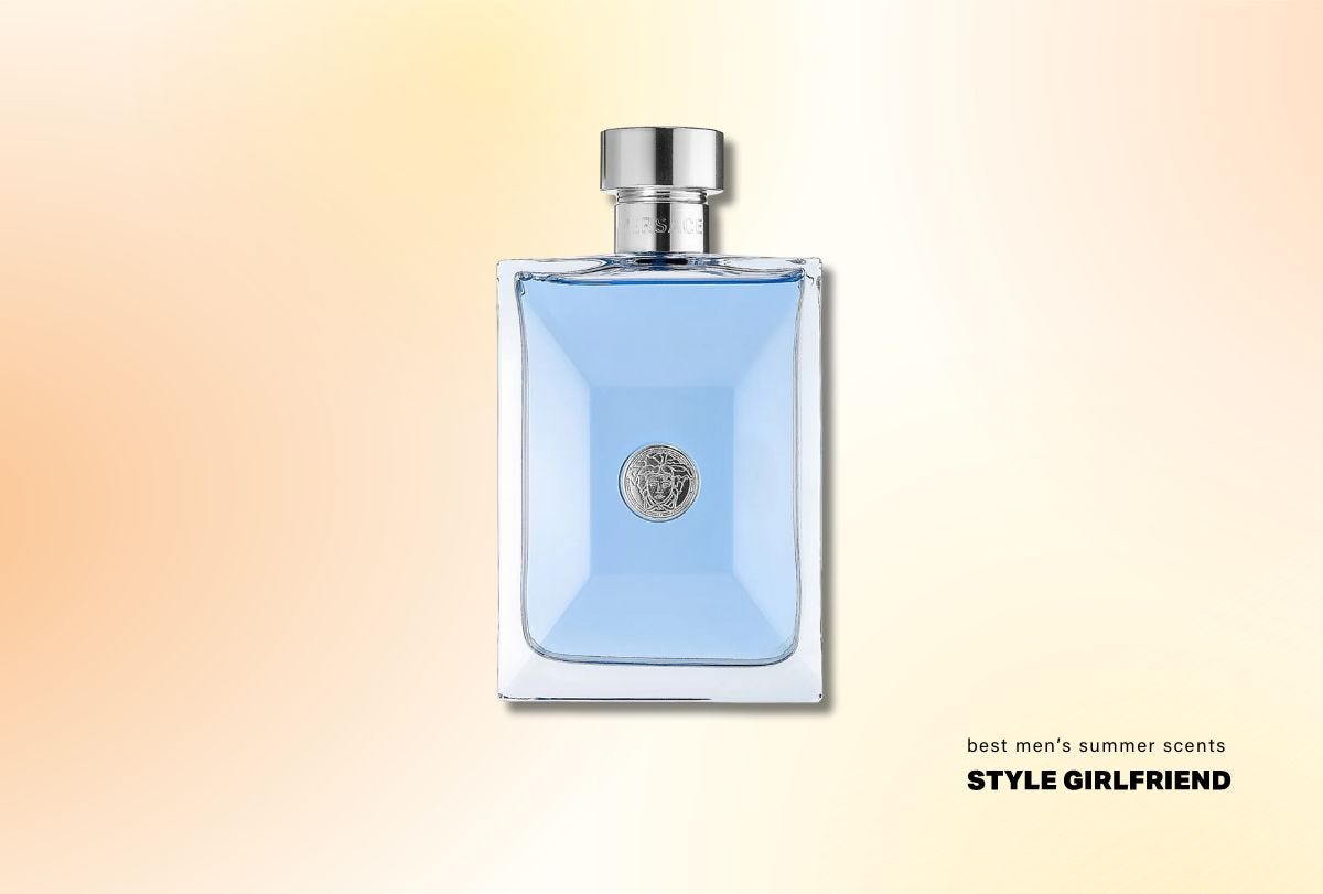 a bottle of blue cologne in a clear bottle with a silver cap