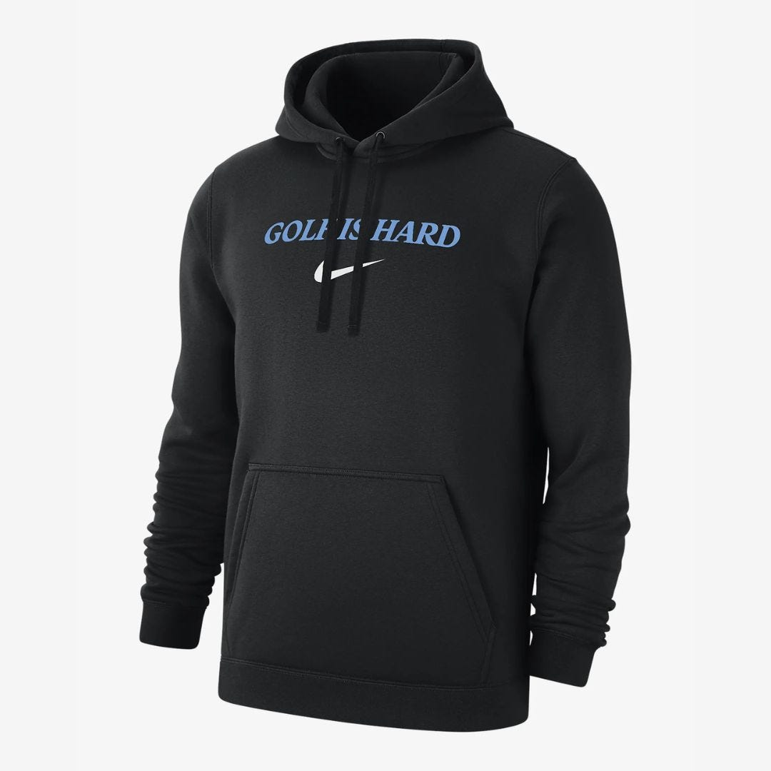 black hoodie sweatshirt that says "golf is hard" across the front with a nike swoosh logo underneath