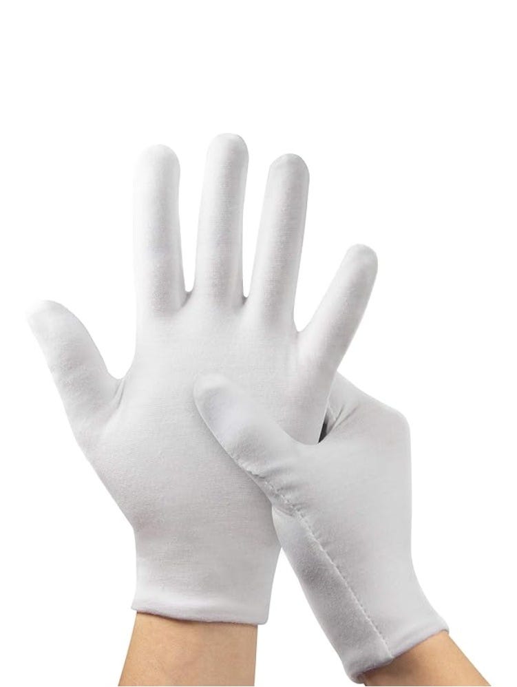 Close-up of two hands wearing white cotton gloves