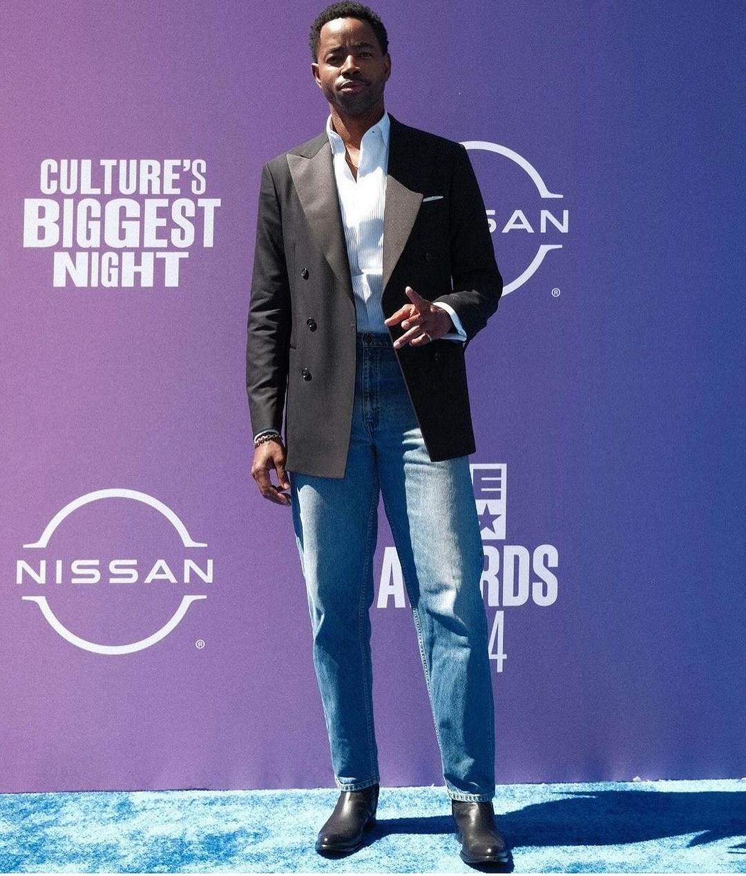 Jay Ellis posing at the 2024 BET Awards