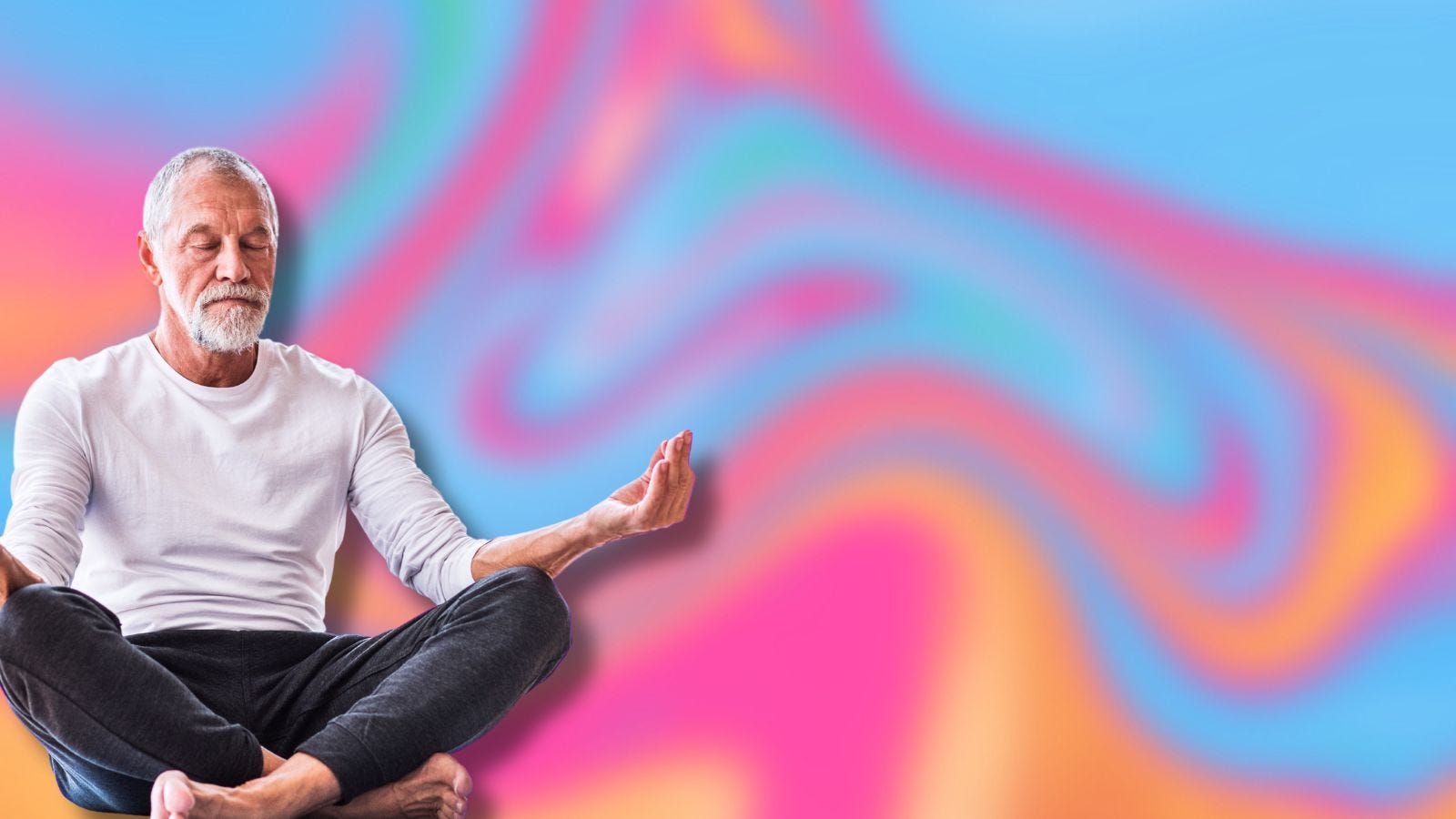 man meditating against a psychedelic background