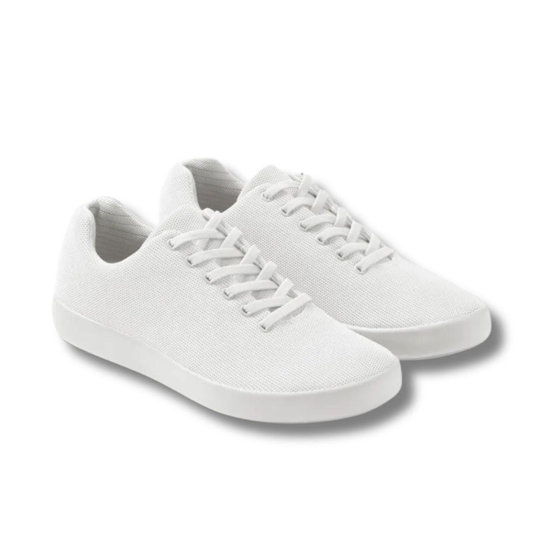 a pair of white knit sneakers