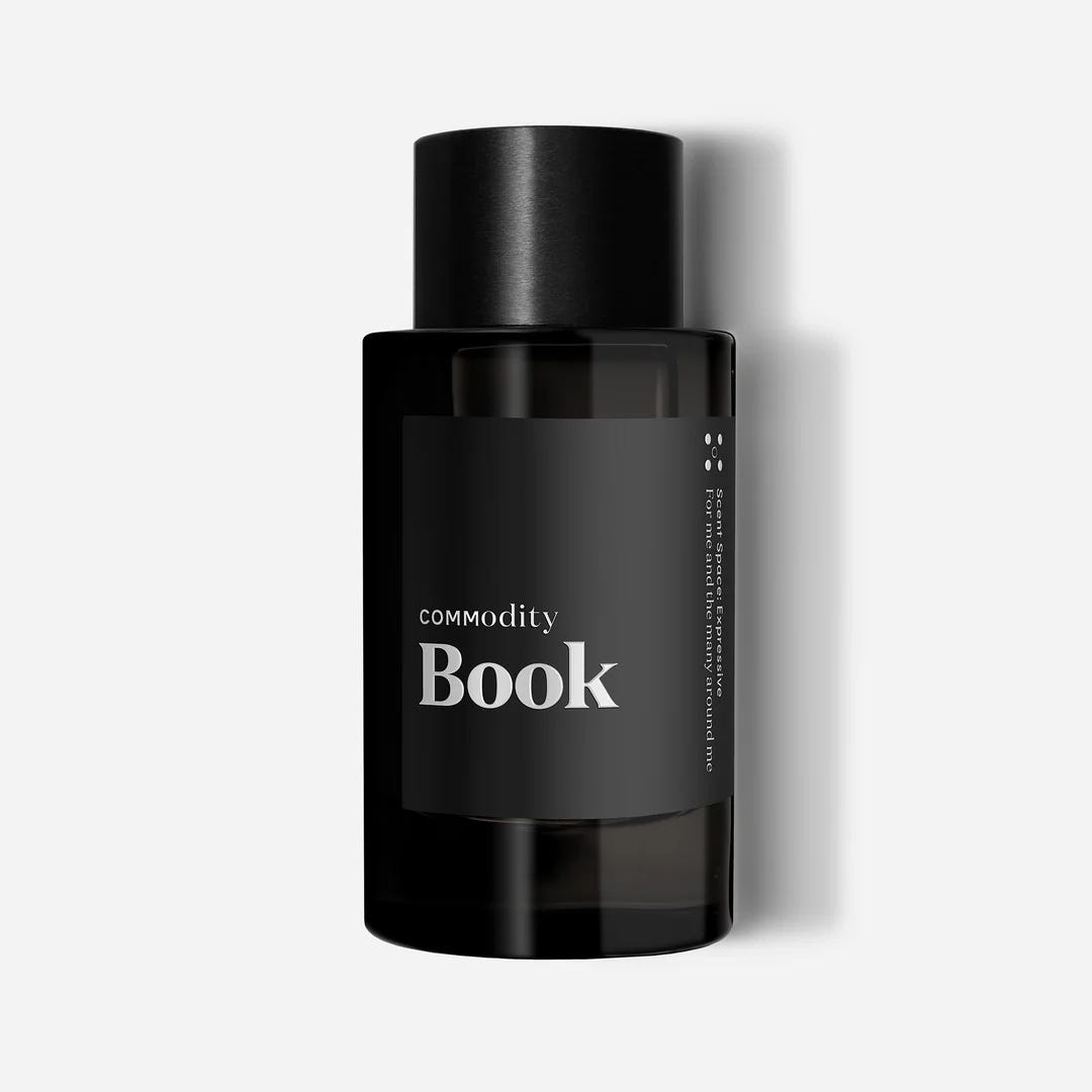 commodity book fragrance in black bottle