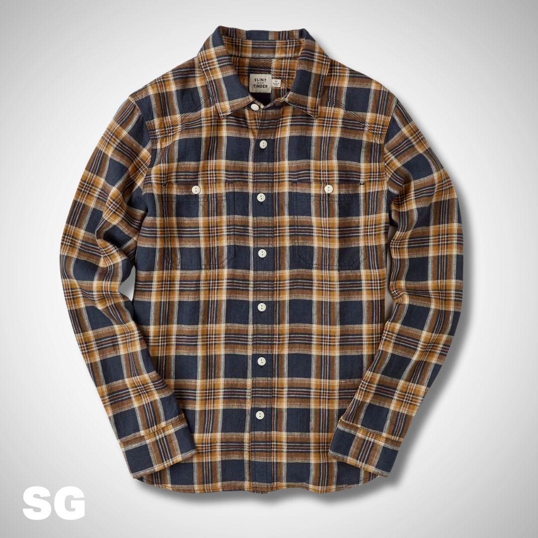 flat lay image of a brown and orange men's plaid shirt