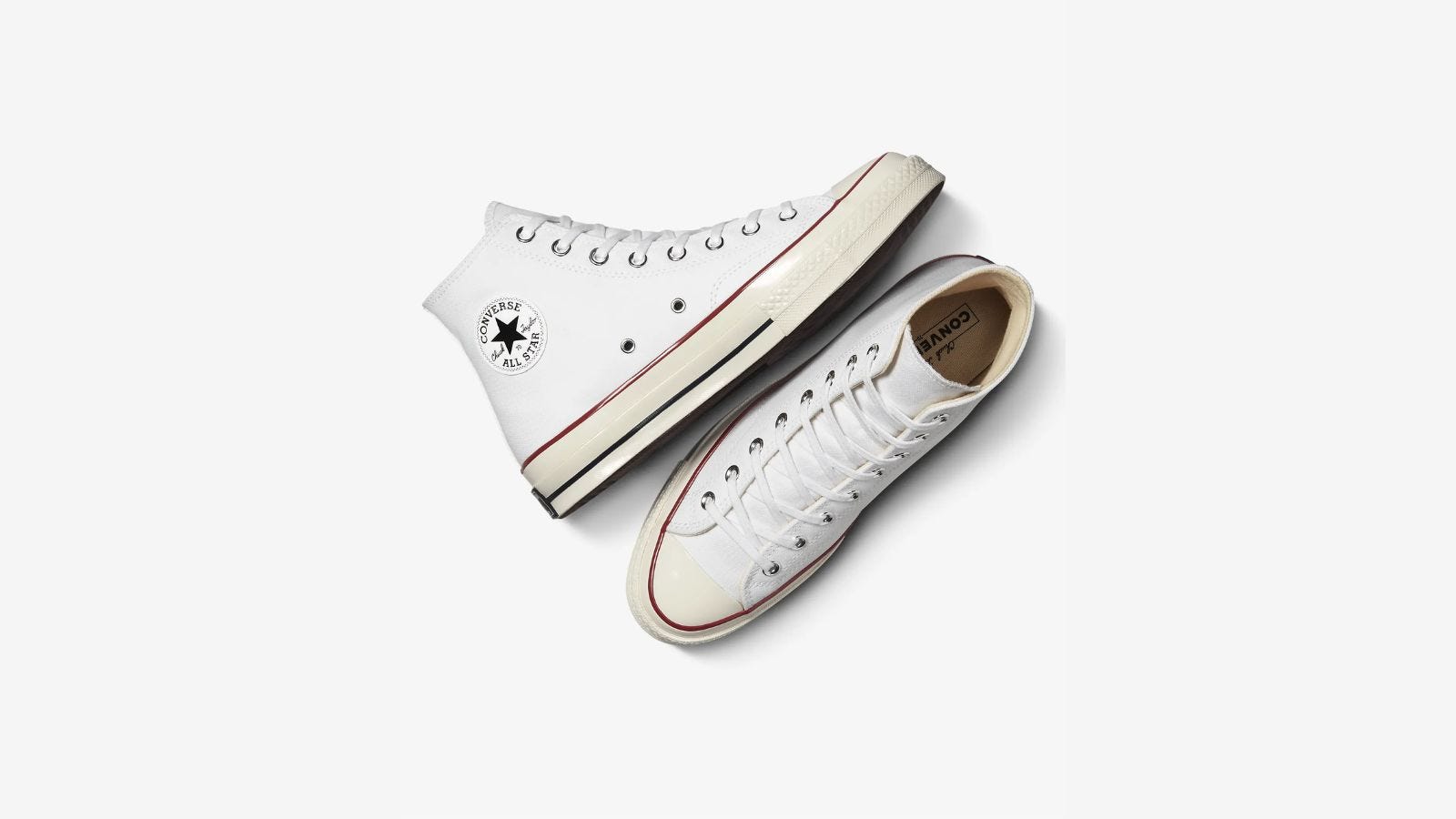 pair of white converse all star sneakers