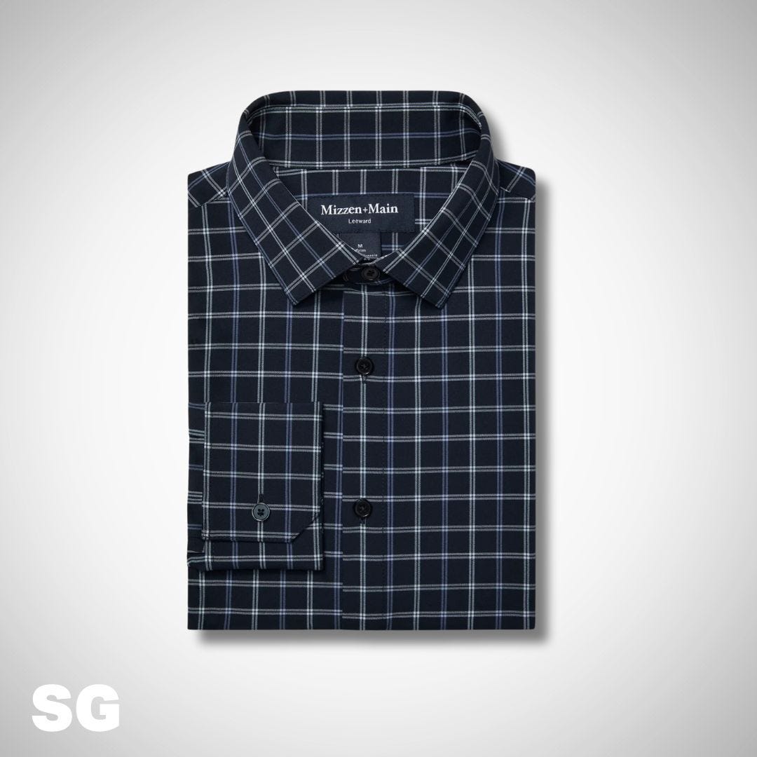 flat lay image of a navy plaid dress shirt