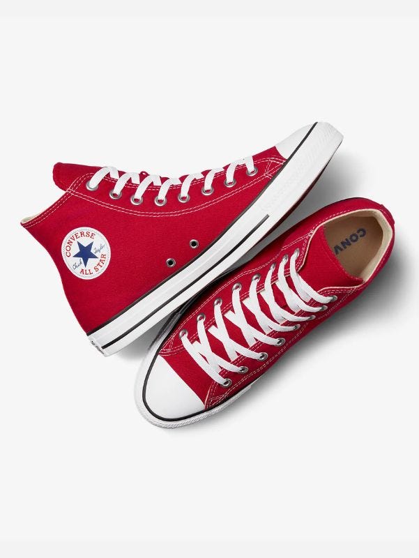 pair of red converse high top chuck taylor sneakers