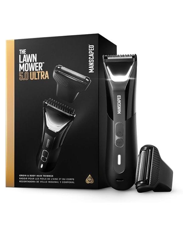 men's body trimmer next to its packaging