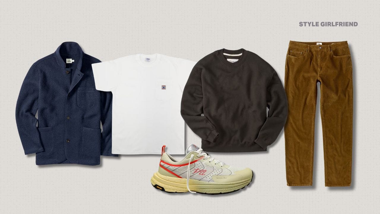 flat lay of a men's outfit with a navy boiled wool blazer, white pocket t-shirt, black crewneck sweatshirt, brown corduroy pants, and white running sneakers