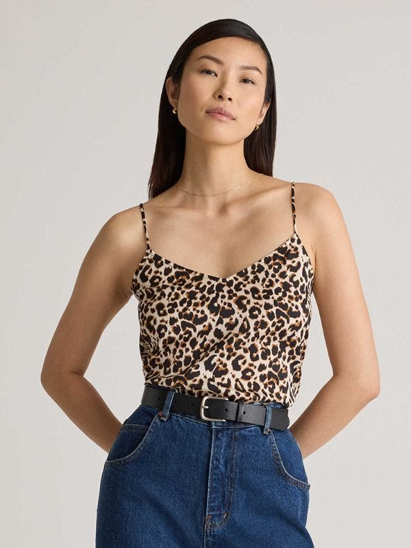 woman wearing a leopard-print camisole