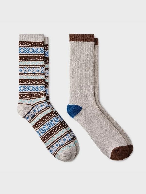 two pairs of men's socks, one fair isle patter and one grey with brown details