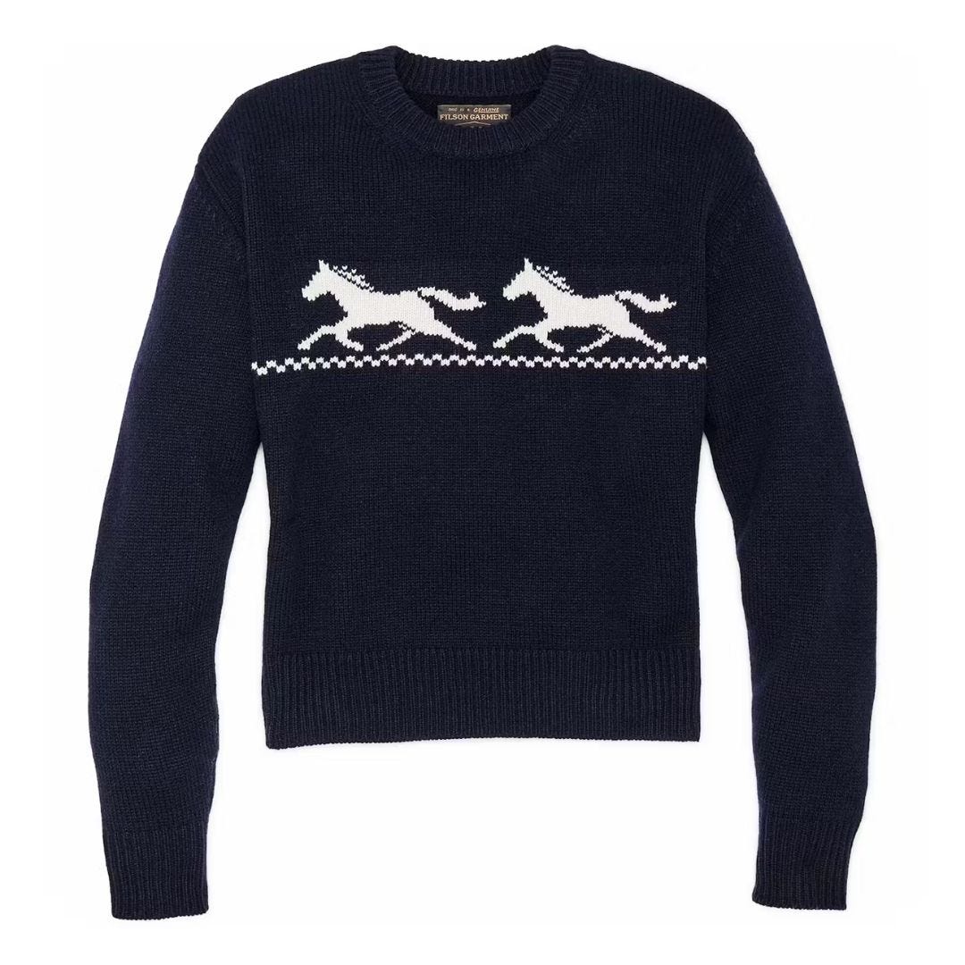 women's navy sweater with two horses on the front