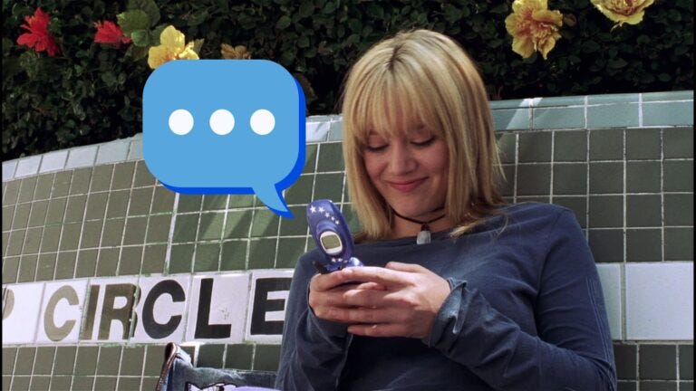 actress hilary duff texting on a flip phone in a still from the movie "A Cinderella Story"