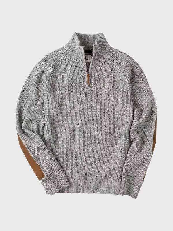 quarter zip grey sweater with brown detailing on the sleeves