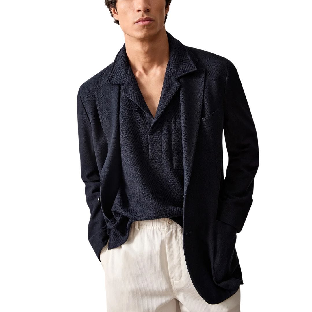 stylish man wearing a navy knit blazer