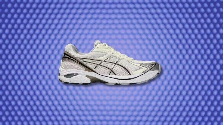 feature image for men's asics sneakers outfits. shown: a single Asics gt-2160 sneaker