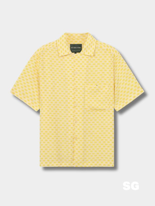 yellow textured short sleeve button down shirt