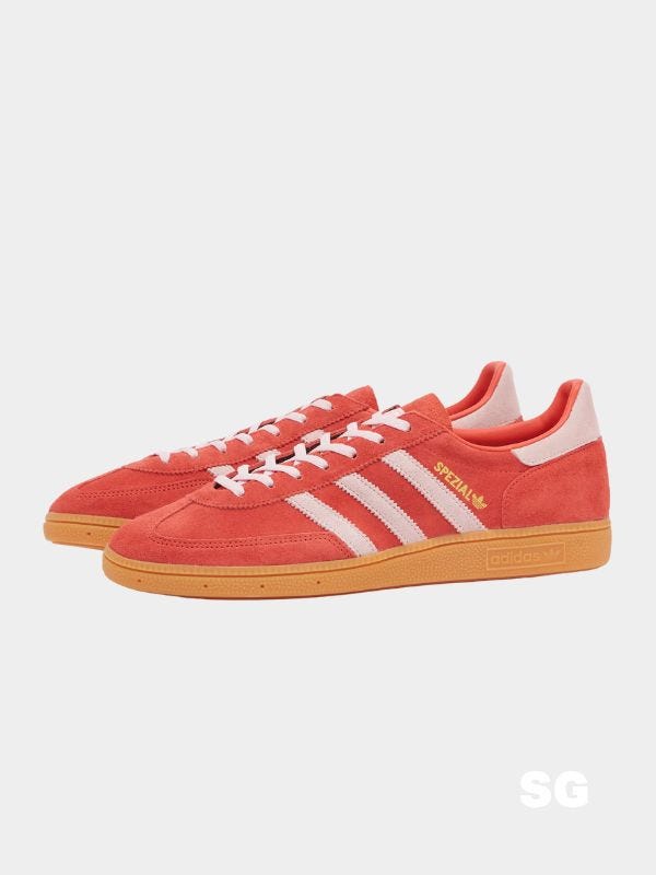 red and pink adidas sneakers