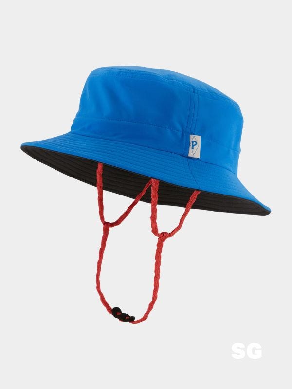 blue brimmed hat with red strap