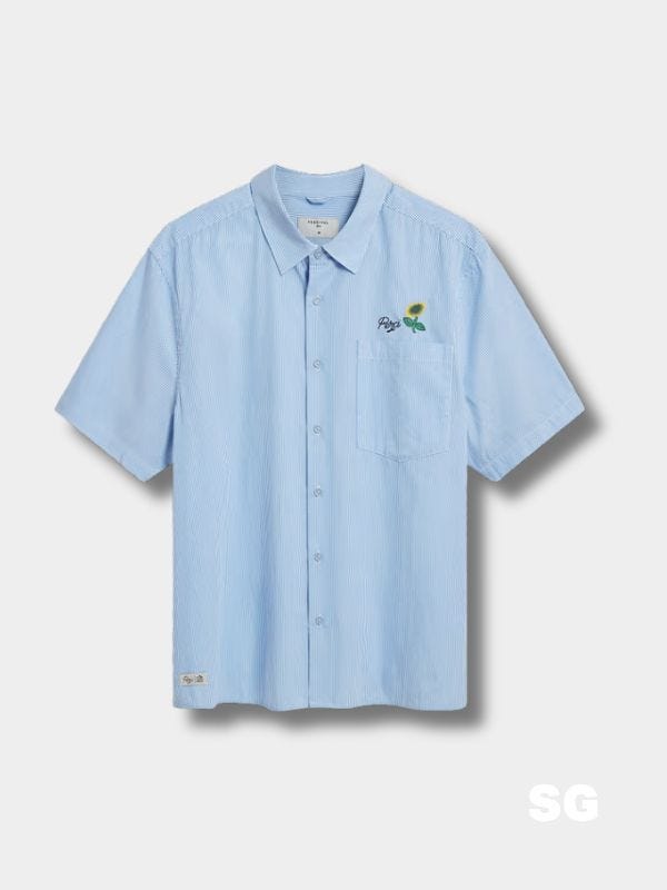 light blue short-sleeve button down shirt