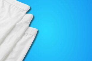 flat lay image of 3 white pairs of men's underwear