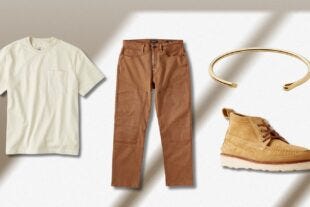 men's outfit flat lay of an off-white short-sleeve shirt, brown work pants, a gold cuff bracelet and brown lace-up boots